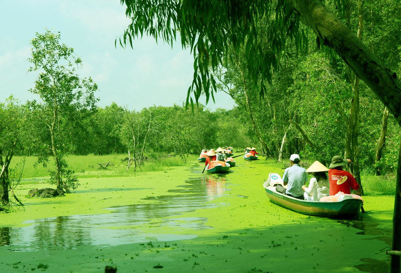 Boating on the green islands is an experience you cannot miss when coming to Vietnam