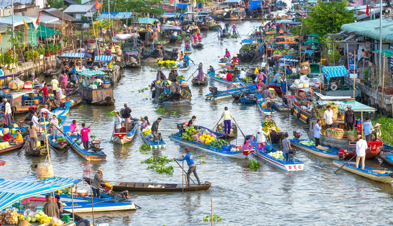 Bustling scene at a floating market on the Mekong Delta